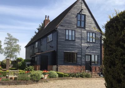 Exterior barn painting, Bures, Suffolk